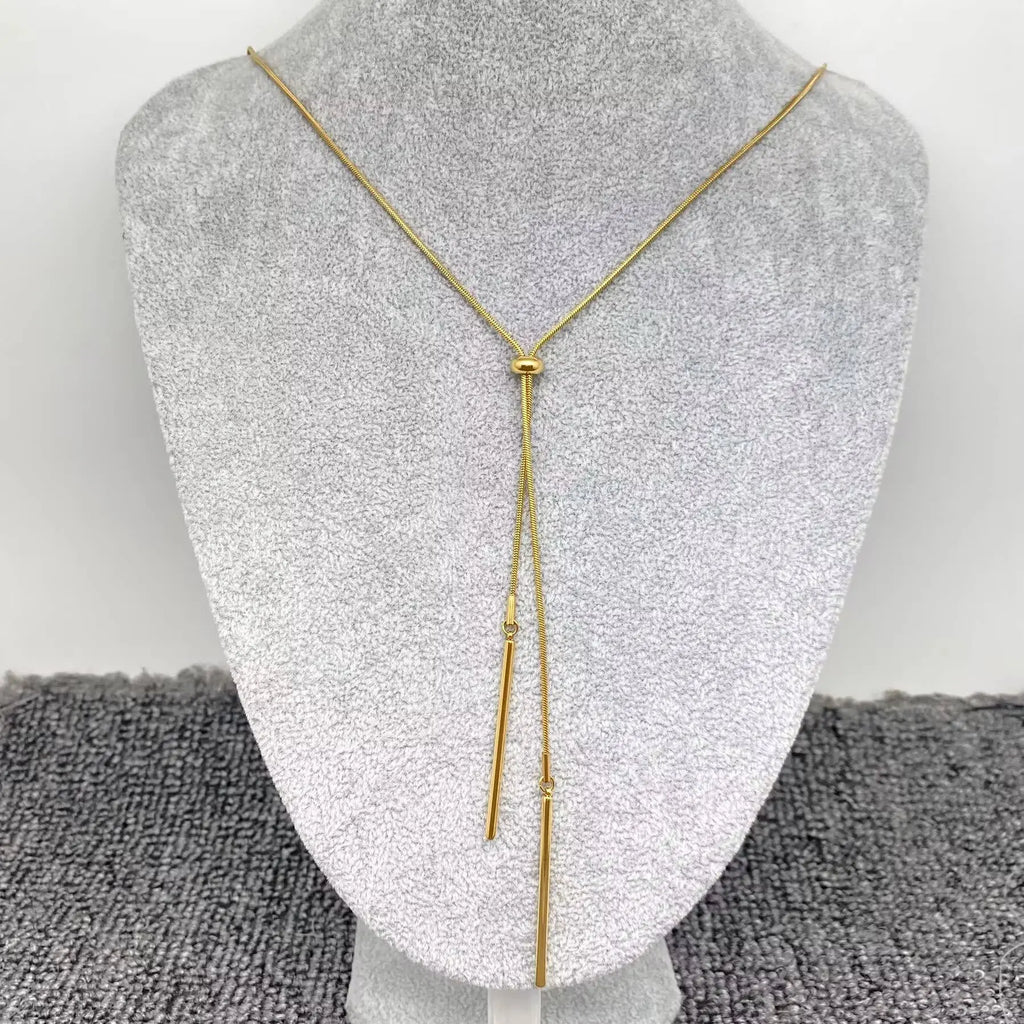 Gold Lariat Necklace - 18K Stainless Steel Y Chain worn by model | Veloria