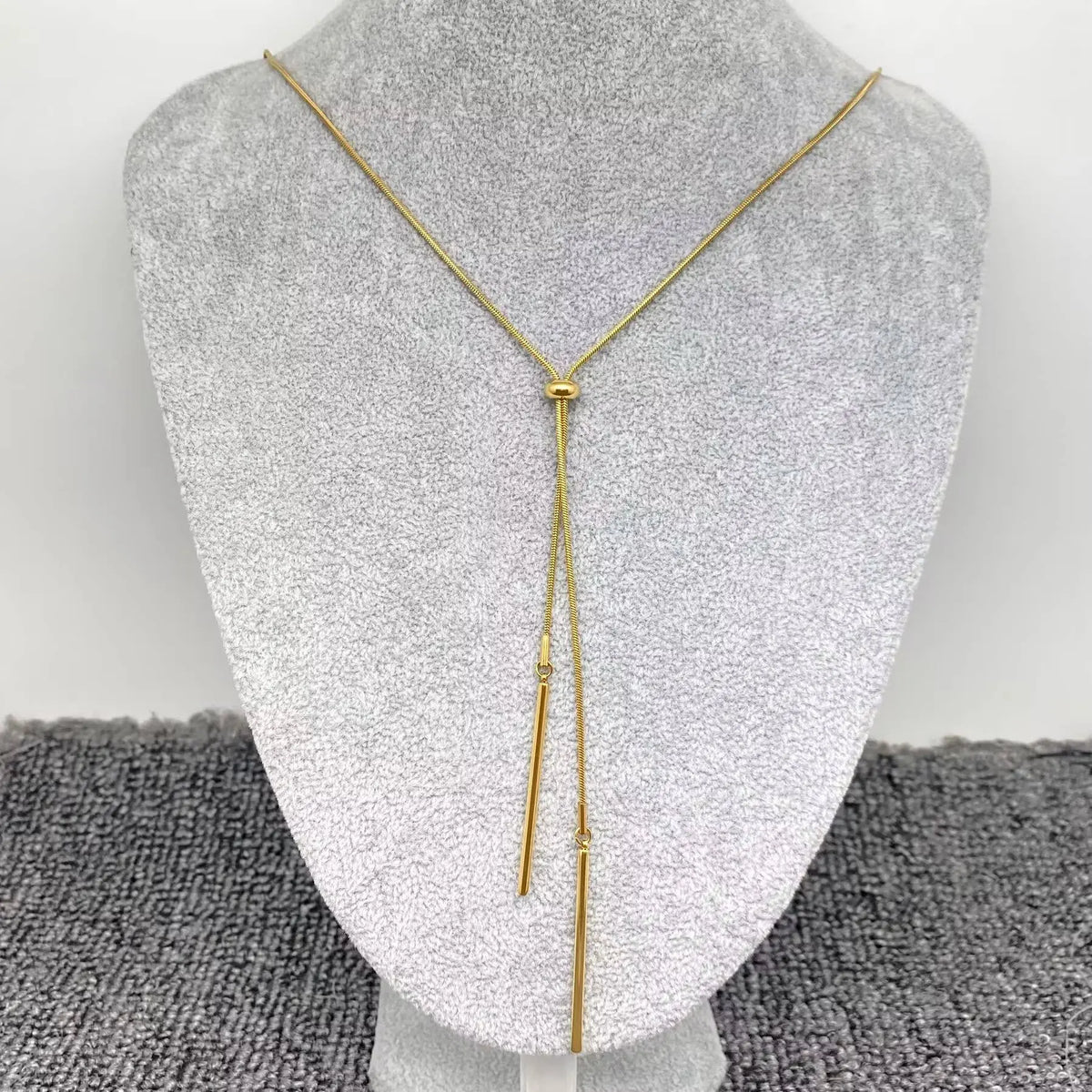 Gold Lariat Necklace - 18K Stainless Steel Y Chain worn by model | Veloria
