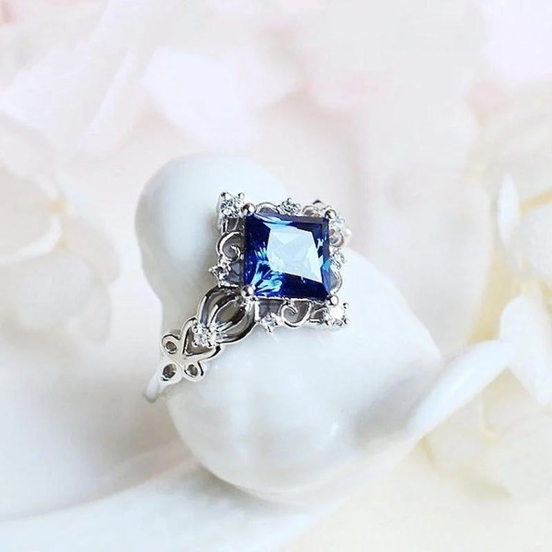 Lab Sapphire Ring - princess cut ring worn by model | Veloria