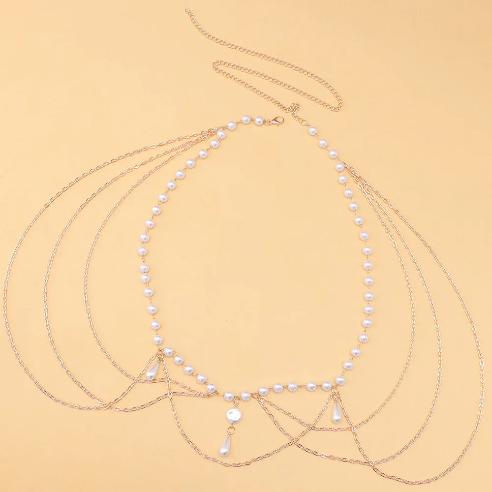 Vintage Pearl Tassel Chain Belt - belt flat lay | Veloria