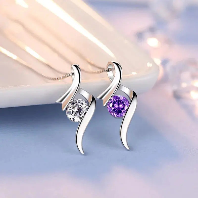 Ribbon Pendant Necklace - purple zircon ribbon charm detail | Veloria
