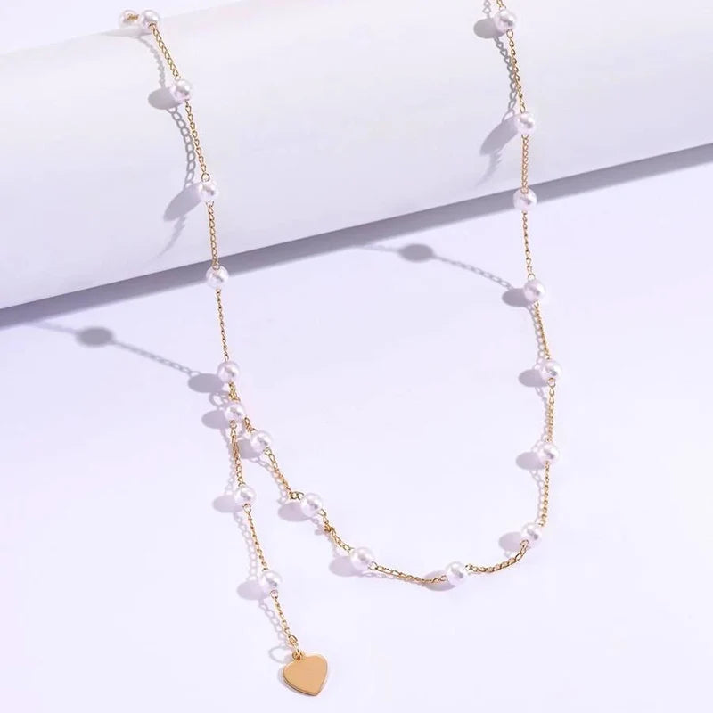 Vintage pearl belly body chain waist belt for women - close-up detail | Veloria