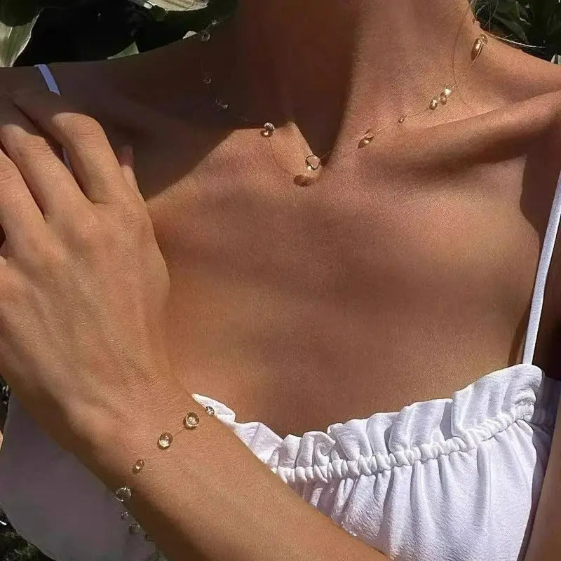 Clear Water Drop Necklace & Bracelet Set worn by model | Veloria