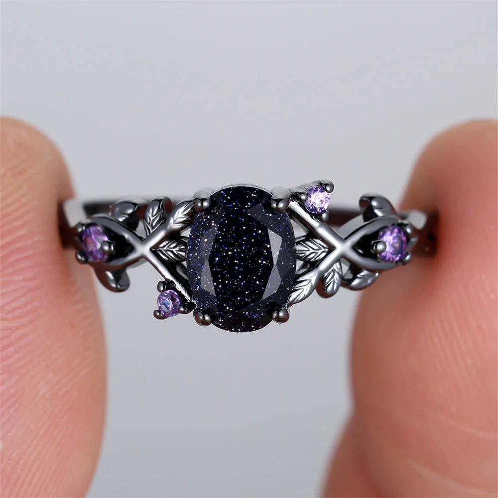 Blue Oval Zircon Ring - Vintage Black Metal - worn by model | Veloria