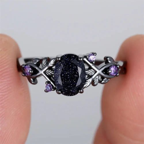 Blue Oval Zircon Ring - Vintage Black Metal - worn by model | Veloria