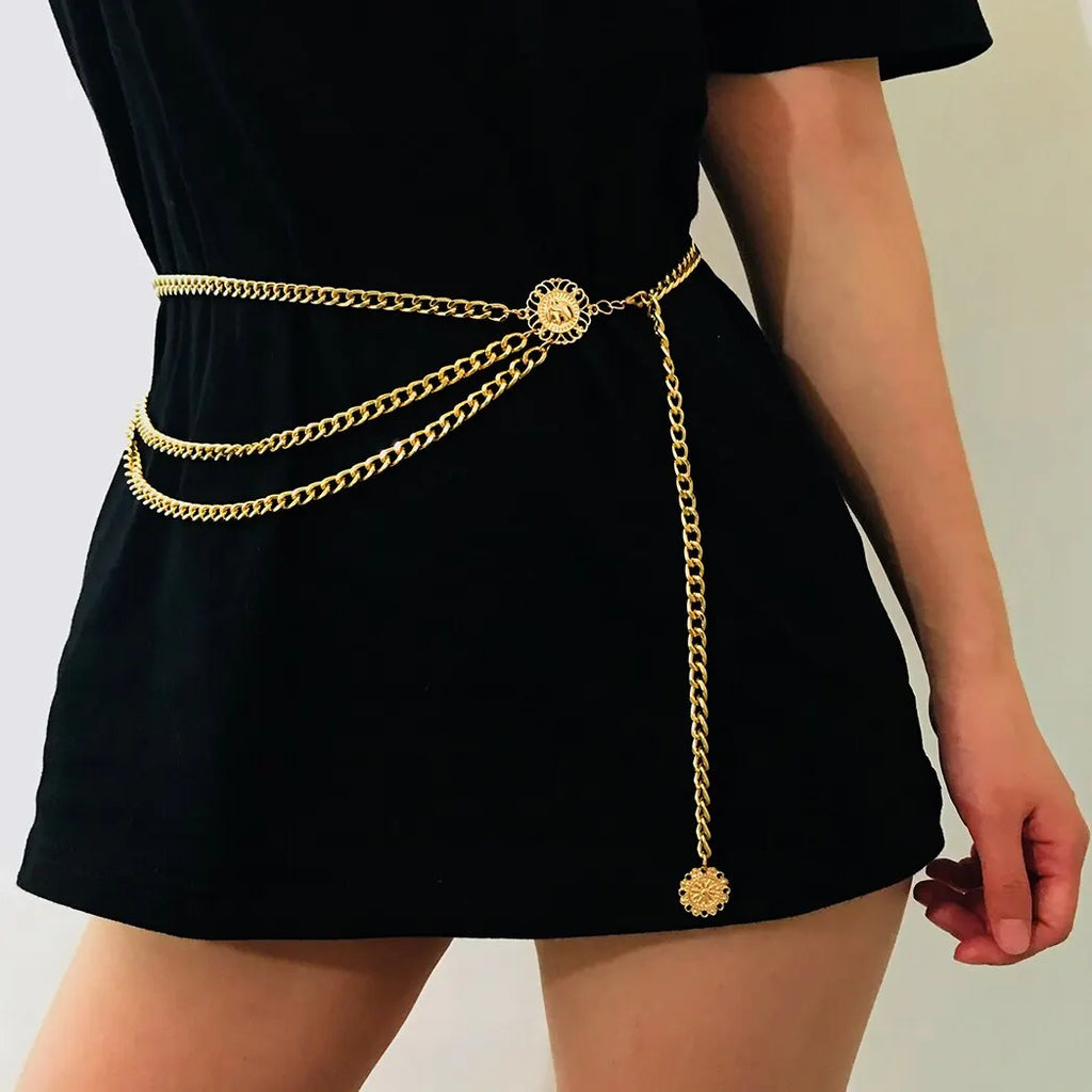 Boho sunflower coin tassel waist belly chain for women - worn by a woman, front view | Veloria