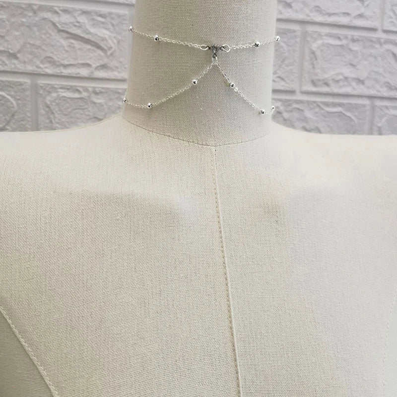 Crystal metal body chain bikini jewelry for women - side view on model | Veloria