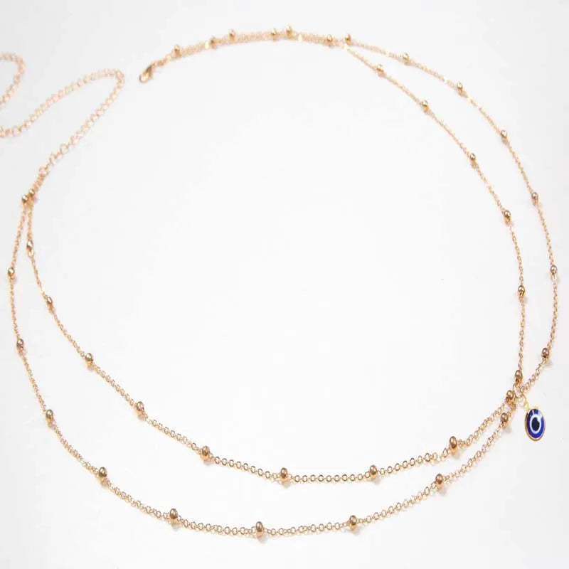 Double layer gold beaded waist chain for women - styled with evening wear | Veloria