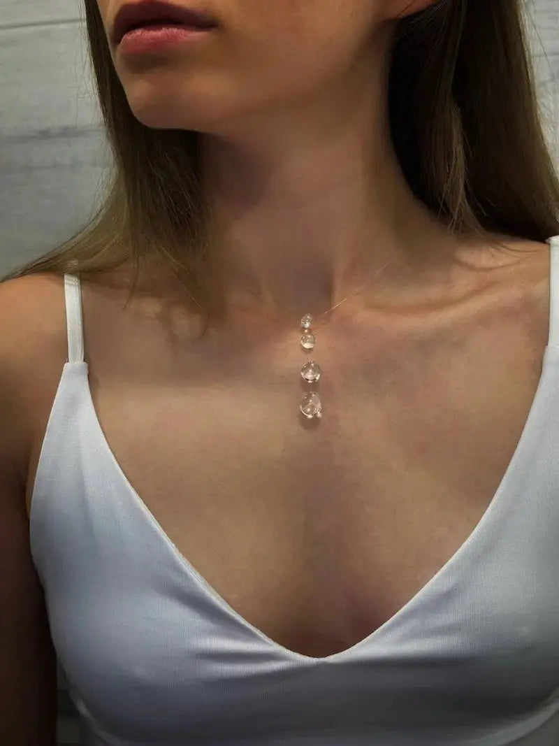Clear Dewdrop Tassel Pendant Necklace worn by model | Veloria