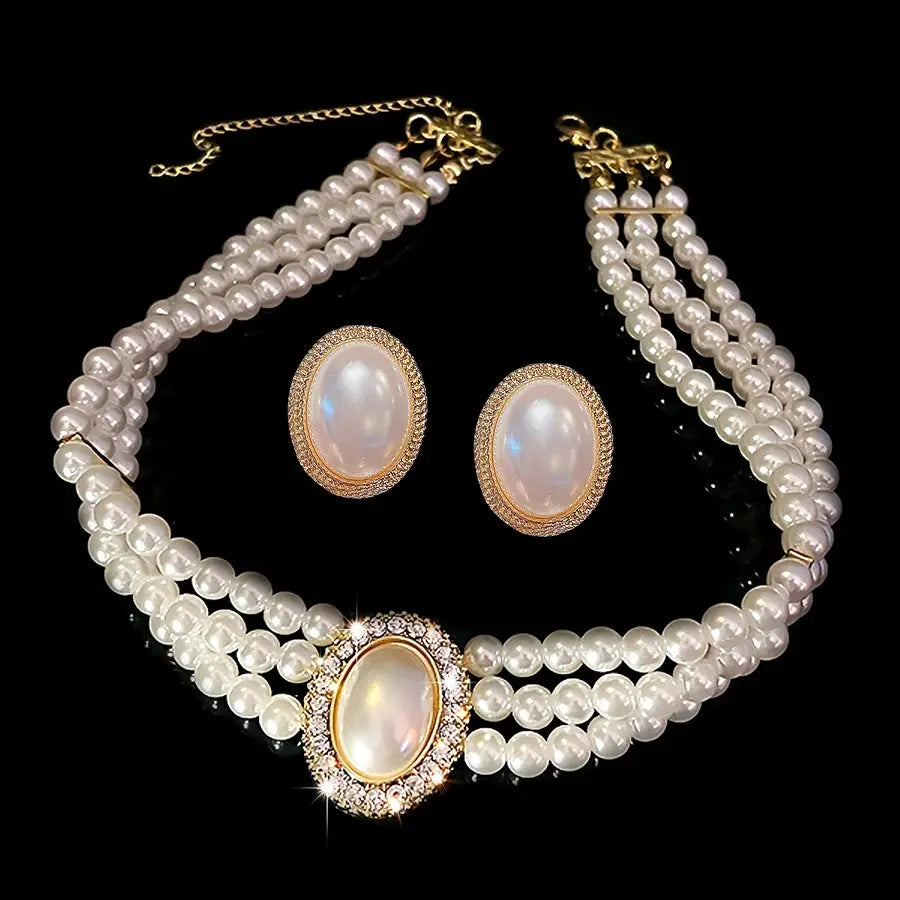 Bridal Pearl Necklace Set - multi layer pearls worn by model | Veloria