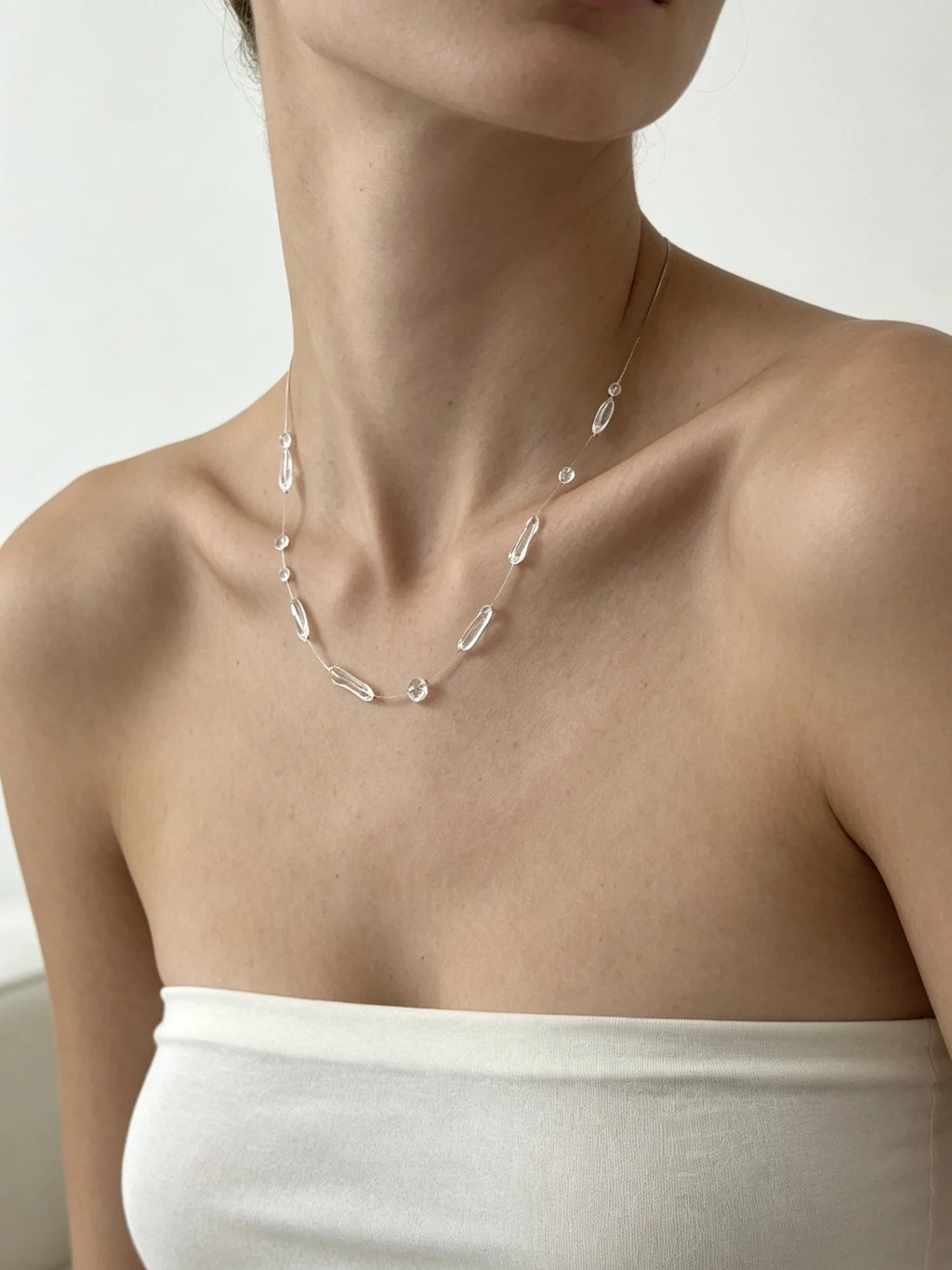 Irregular Clear Bead Necklace - Resin Dewdrop - close-up detail | Veloria