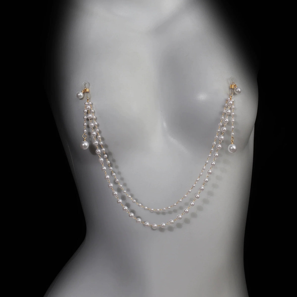 Layered pearl tassel chest chain body chain for women - worn by a woman, front view | Veloria