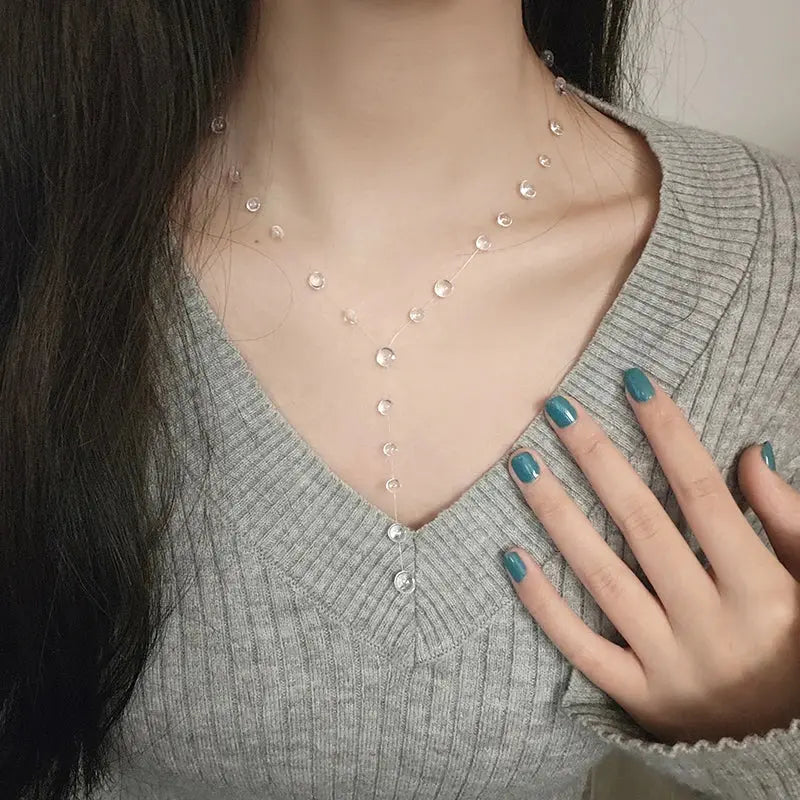 Clear Dewdrop Tassel Pendant Necklace - product view | Veloria
