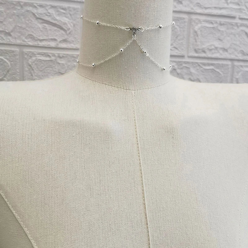 Crystal metal body chain bikini jewelry for women - flat detail shot | Veloria