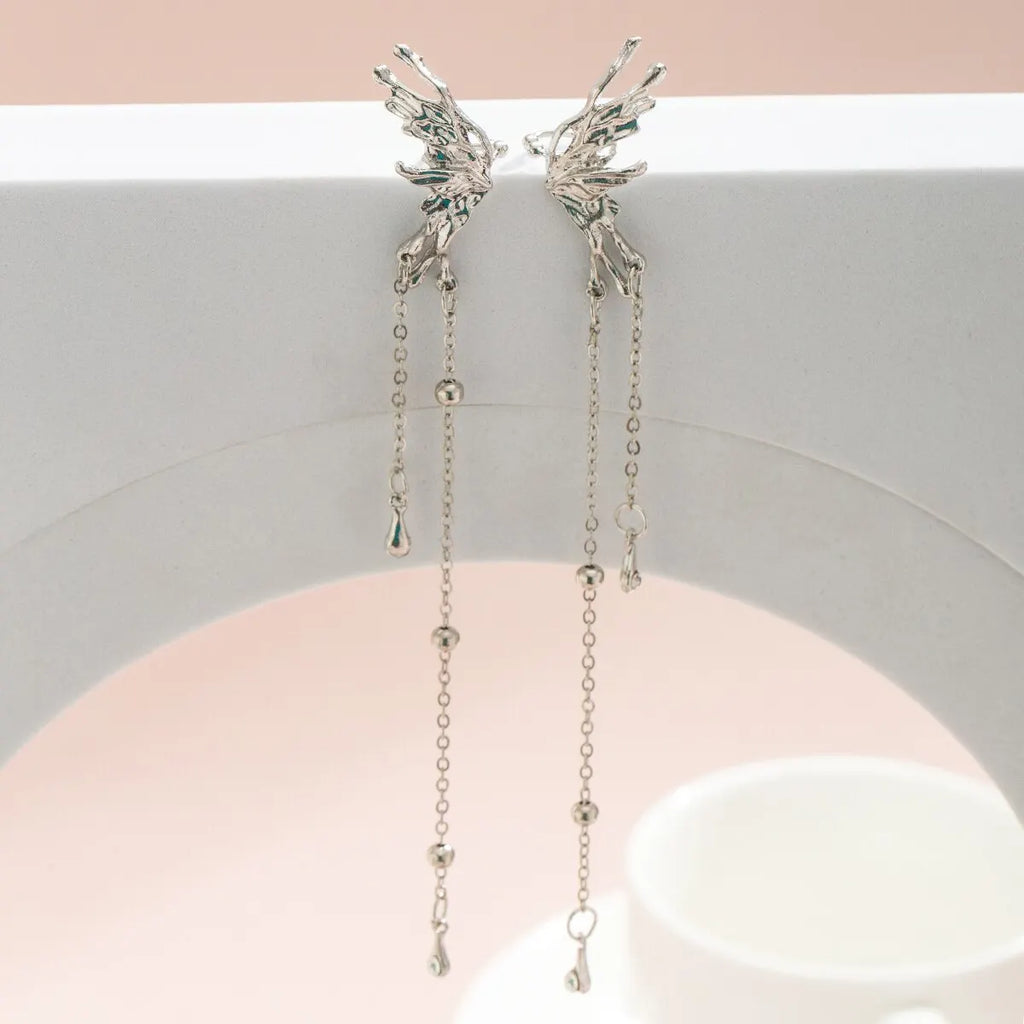 Butterfly Tassel Clip Earrings - pair flat lay | Veloria