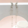 Butterfly Tassel Clip Earrings - pair flat lay | Veloria