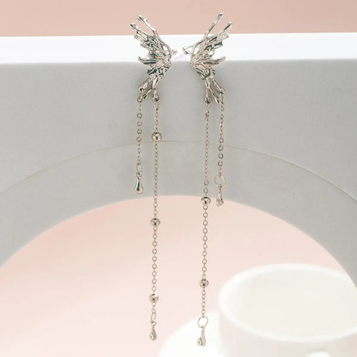 Butterfly Tassel Clip Earrings - side profile view | Veloria
