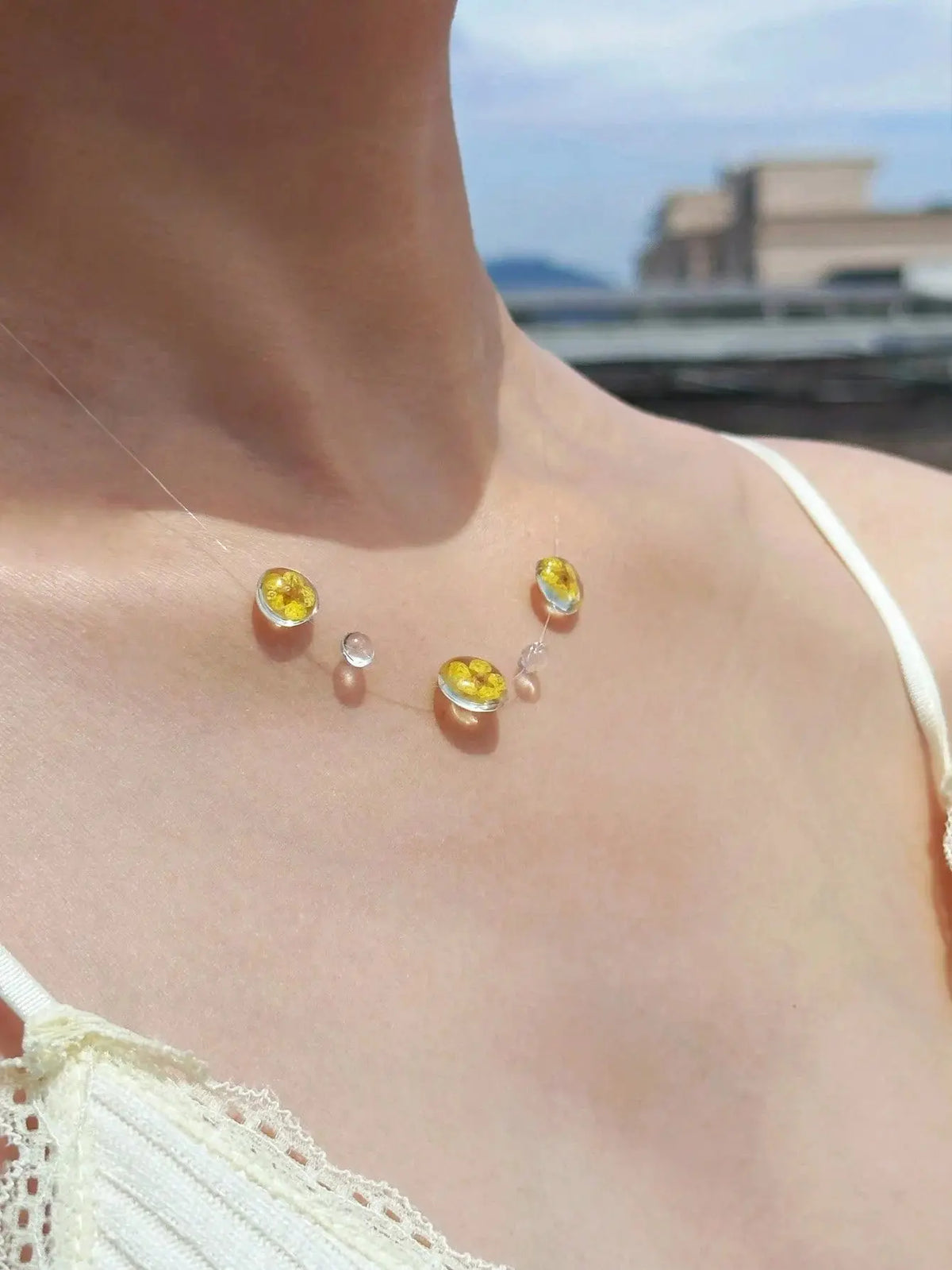 Clear Dewdrop Tassel Pendant Necklace worn by model | Veloria
