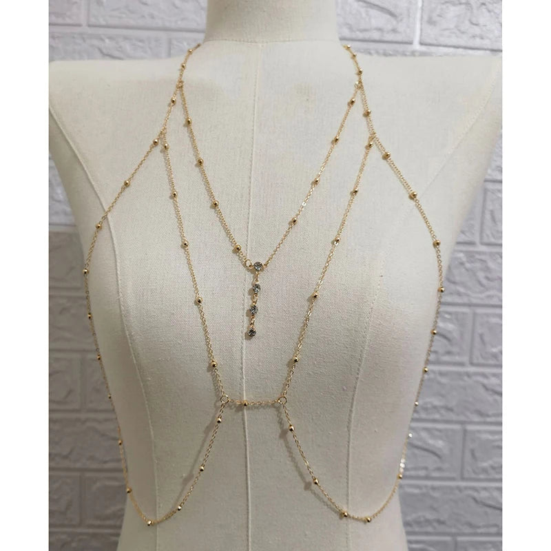 Crystal metal body chain bikini jewelry for women - on model at an event | Veloria