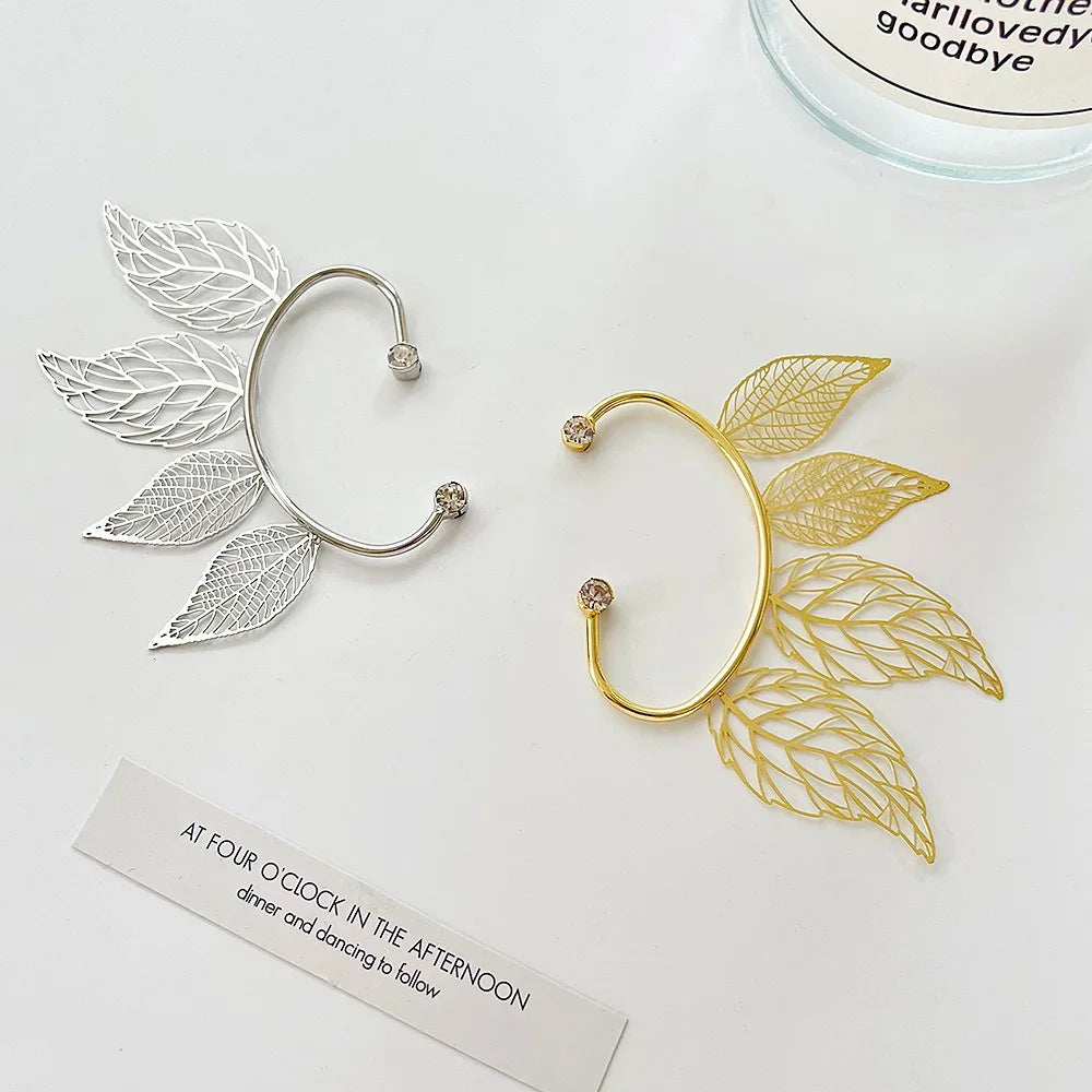 Leaf Zircon Clip Earrings - hollow leaf detail | Veloria