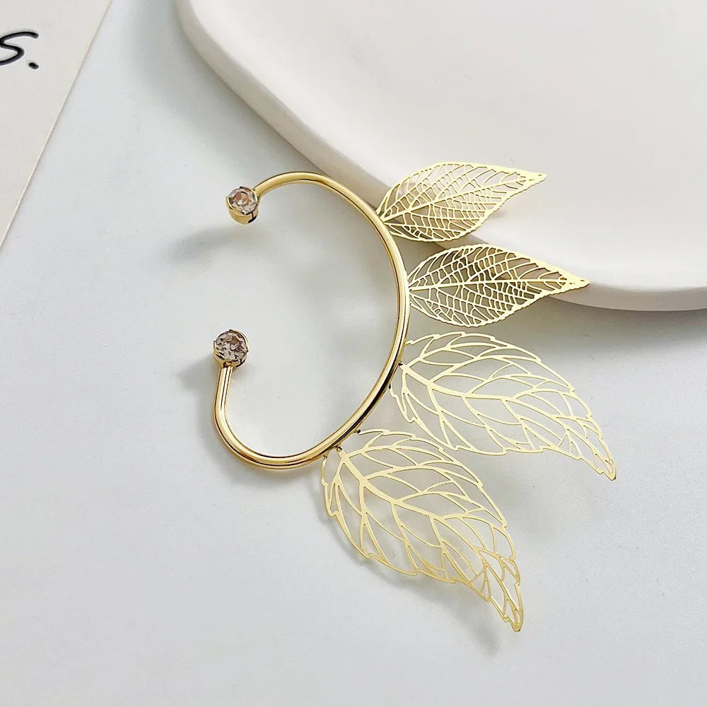Leaf Zircon Clip Earrings - zircon stones close-up | Veloria