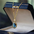 Oval Blue Stone Necklace - 925 Silver Pendant - worn by model | Veloria