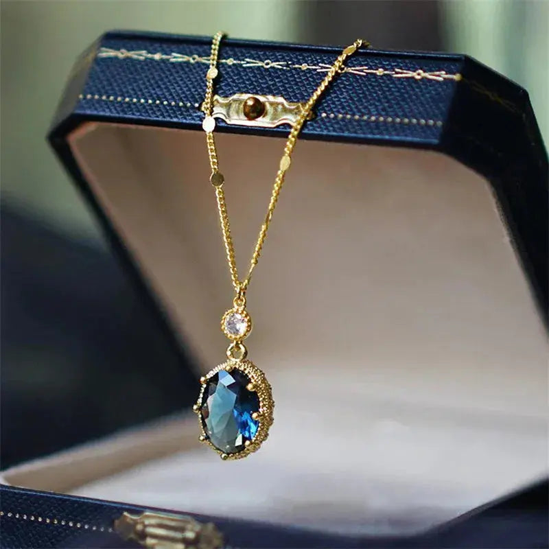 Oval Blue Stone Necklace - 925 Silver Pendant - worn by model | Veloria
