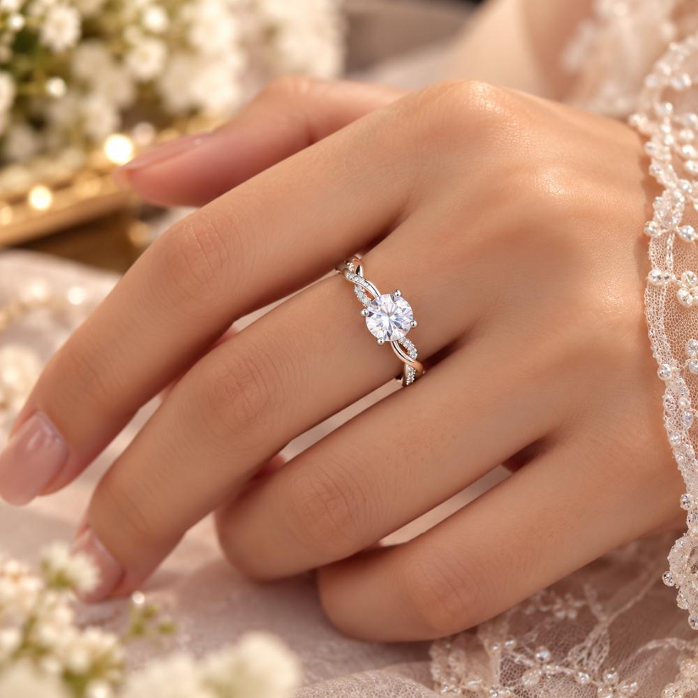 Dainty moissanite promise ring at an angle on a twisted band