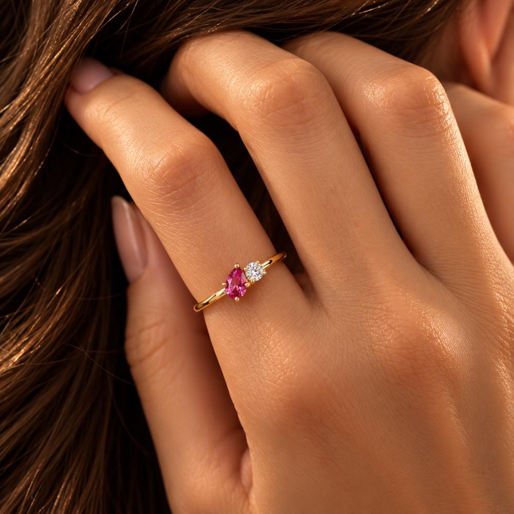 Two stone toi et moi birthstone ring, close-up of the heart gemstones