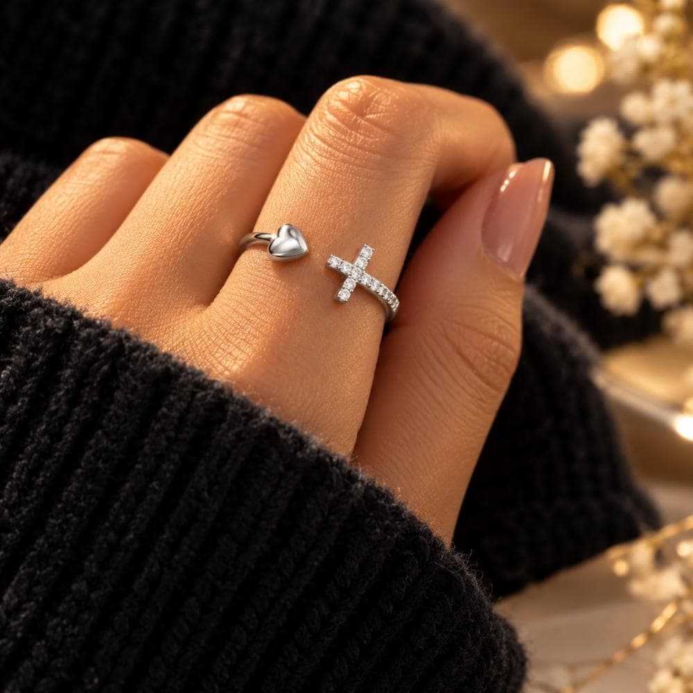 Cross heart ring shown from the side on its silver band