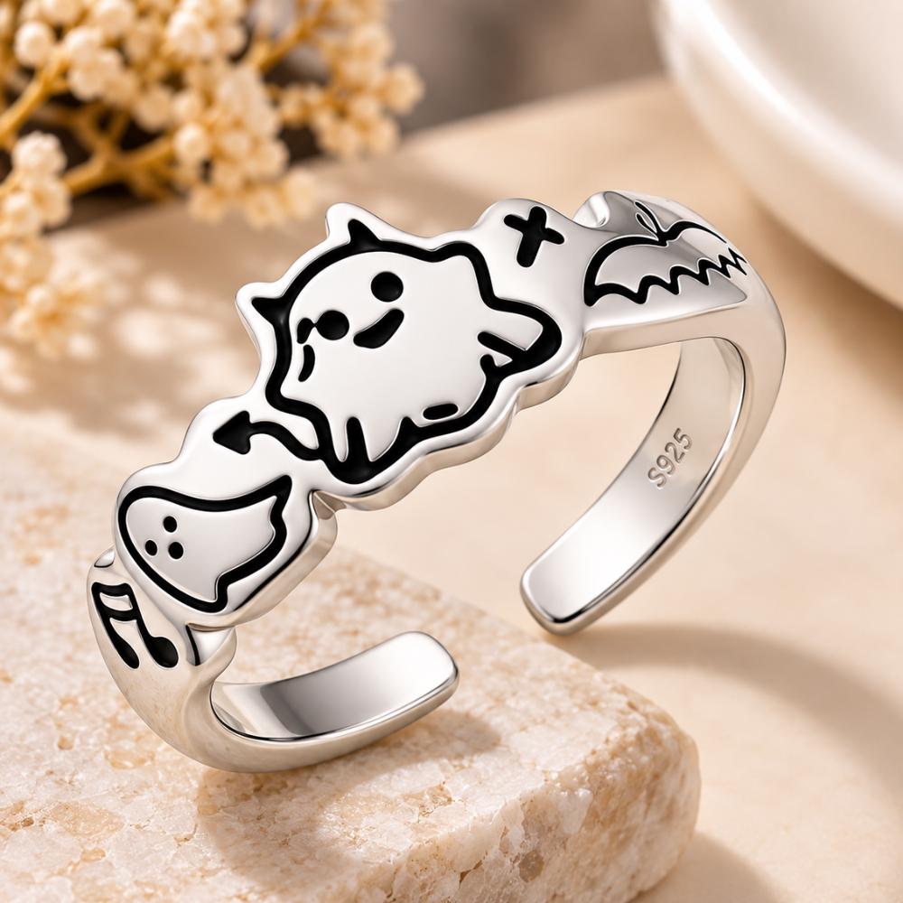 Ghost ring in sterling silver with a cute spooky face worn on the hand