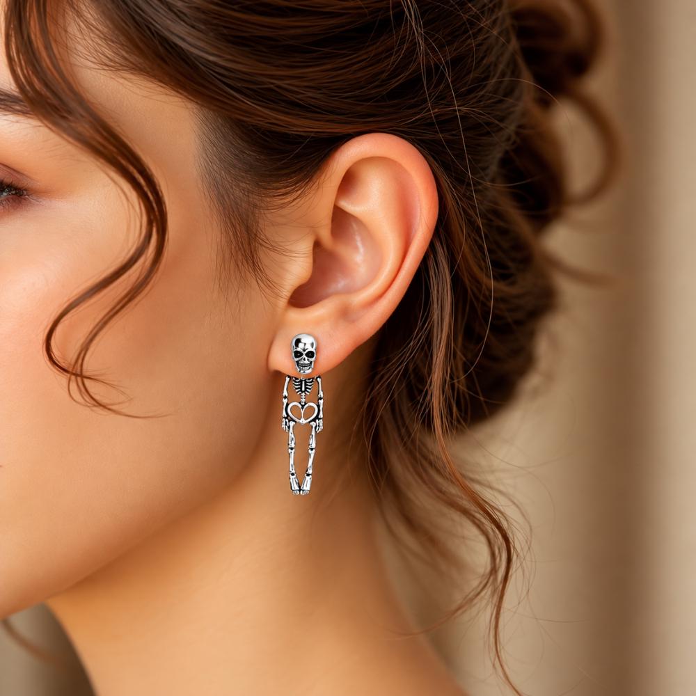 Gothic skull earrings with sparkling moissanite details, close-up view